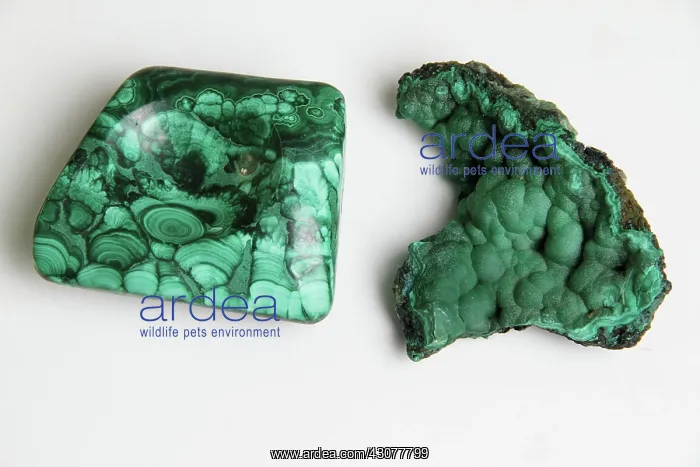 : Malachite, a basic copper carbonate mineral : Malachite, a basic copper carbonate mineral