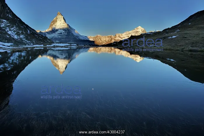  : Matterhorn with reflection Riffelsee at dusk sunrise
