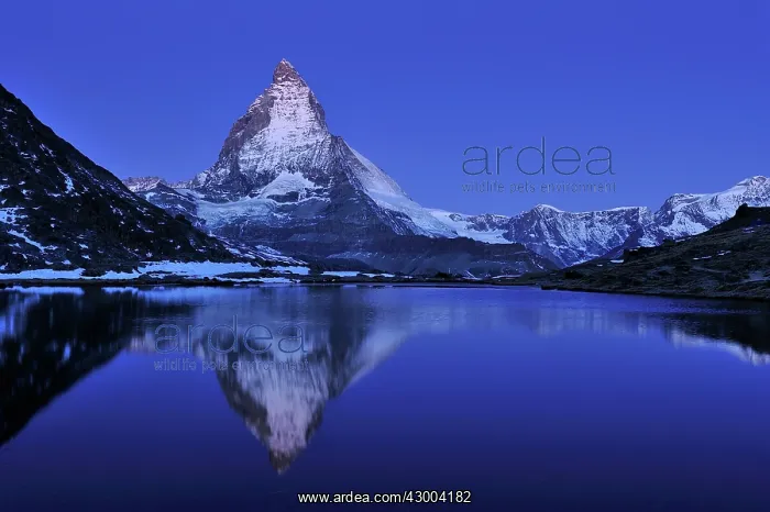 : Matterhorn with reflection Riffelsee at night before sunrise : Matterhorn with reflection Riffelsee at night before sunrise