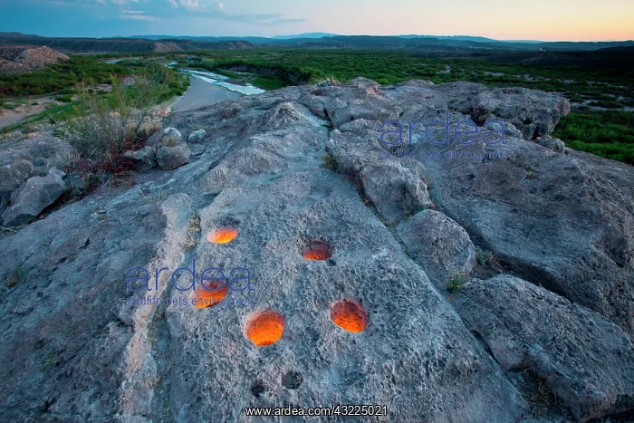 : Metate holes in rock along the Rio Grande : Metate holes in rock along the Rio Grande