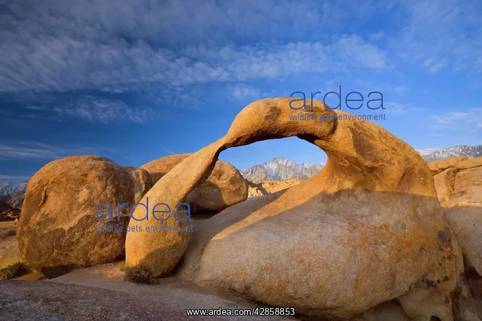 : Mobius Arch - Lone Pine, one of the snow-capped : Mobius Arch - Lone Pine, one of the snow-capped