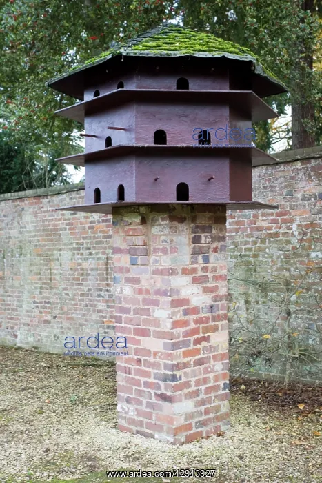 : Modern dovecote on brick stand : Modern dovecote on brick stand