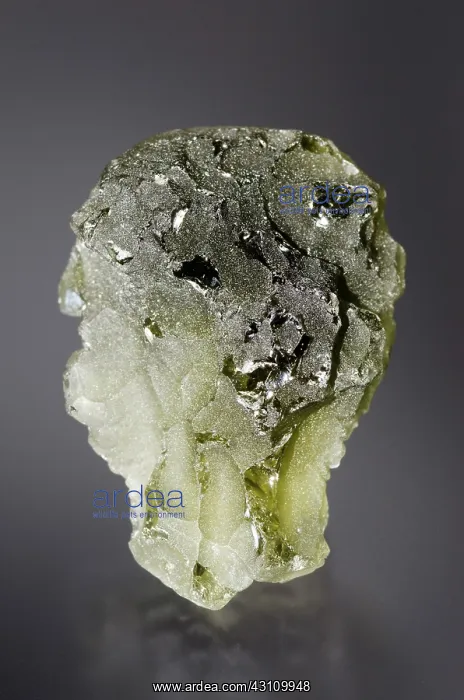 : Moldavite is an olive-green or dull greenish vitreous substance possibly : Moldavite is an olive-green or dull greenish vitreous substance possibly