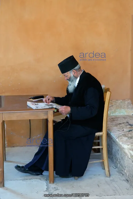 : Monk reading newspaper, Holy Trinity Monastery : Monk reading newspaper, Holy Trinity Monastery
