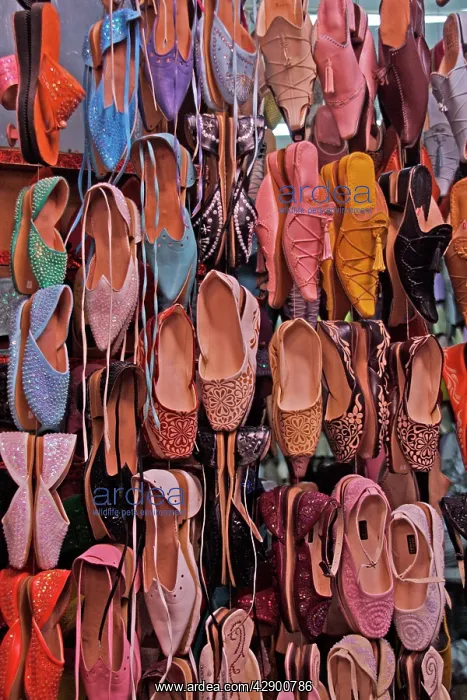 : Morocco - market stall selling traditional shoes : Morocco - market stall selling traditional shoes