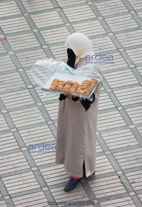  : Morocco - Woman selling cookies at Marrakesh's