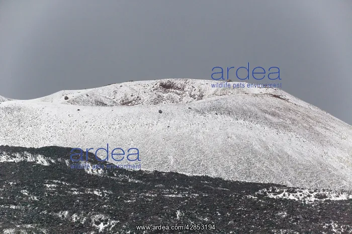 : Mount Etna during a hail storm : Mount Etna during a hail storm