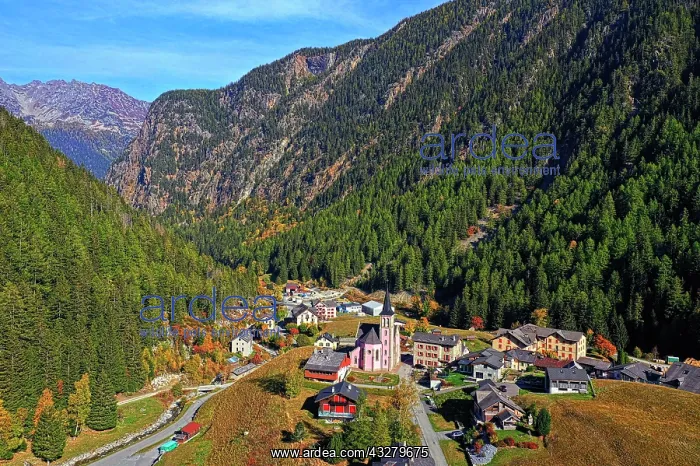 : Mountain village Trento in autumn, drone shot, Vall&, x9960;d : Mountain village Trento in autumn, drone shot, Vall&, x9960;d