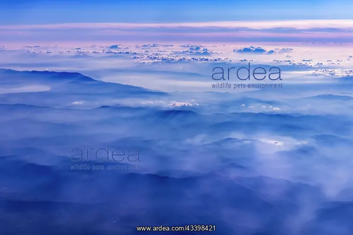 : Mountains and clouds, mountain peaks in blue light : Mountains and clouds, mountain peaks in blue light