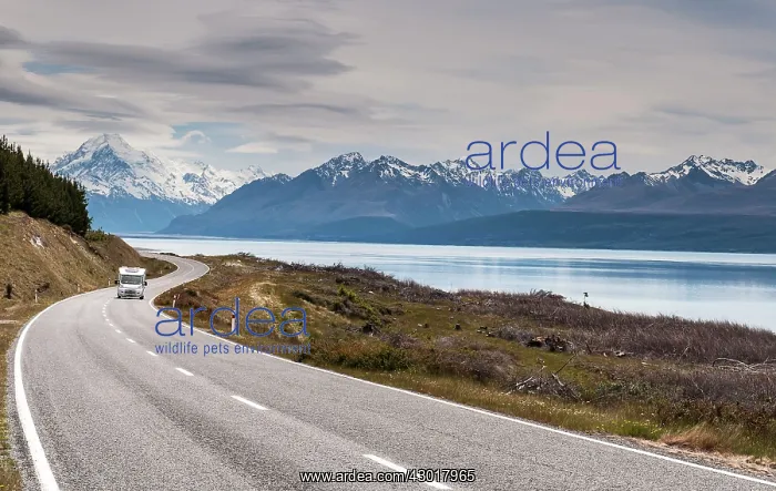  : Mountains Scene with caravan on road