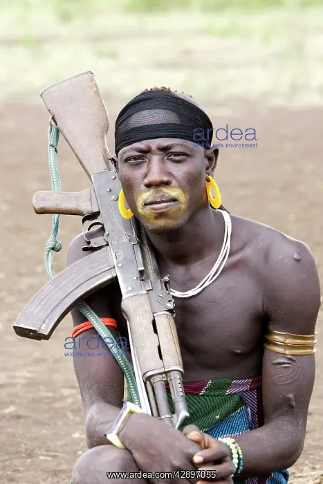 : Mursi people - Man with kalachnikof : Mursi people - Man with kalachnikof
