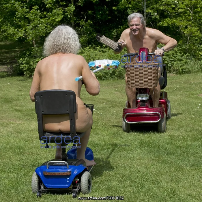: NUDE older couple jousting on mobility scooters : NUDE older couple jousting on mobility scooters