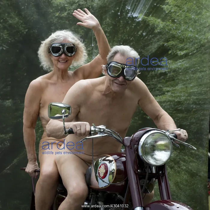 : Nude older couple on a motorbike : Nude older couple on a motorbike
