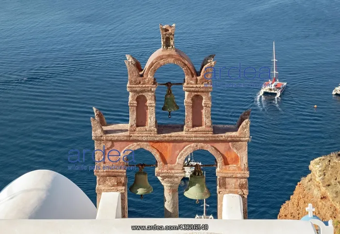 : Old belfry wiith yacht and blue sea, Ia, Oia, Sa : Old belfry wiith yacht and blue sea, Ia, Oia, Sa
