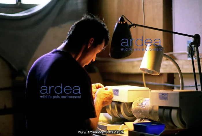 : Opal mining opal being polished Coober Pedy : Opal mining opal being polished Coober Pedy