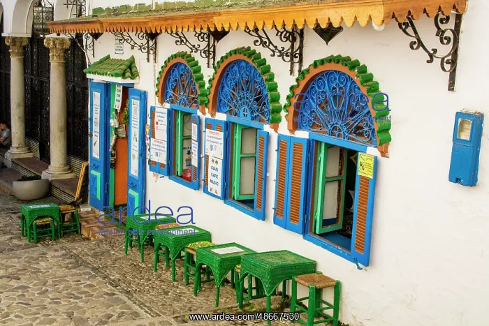 : Outdoor cafe along a narrow street in the Bab Haha district