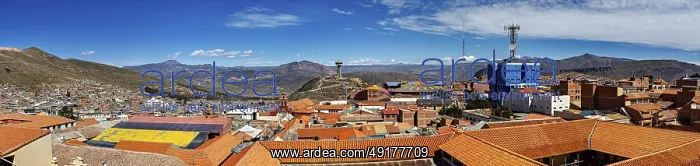 : Panoramic view of a city with orange-coloured roofs : Panoramic view of a city with orange-coloured roofs