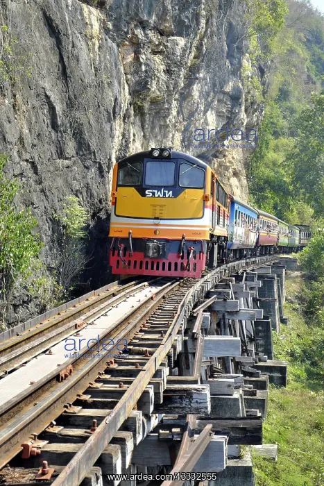: Passenger train runs on wooden bridge, Thamkra Sae : Passenger train runs on wooden bridge, Thamkra Sae