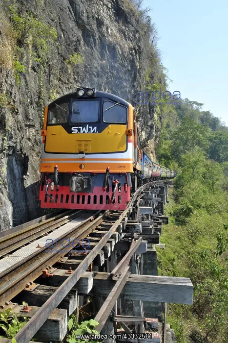 : Passenger train runs on wooden bridge, Thamkra Sae : Passenger train runs on wooden bridge, Thamkra Sae