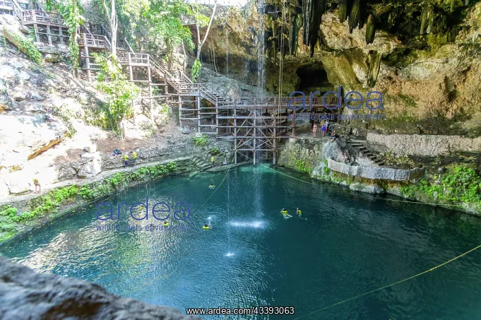 : People swimming in Cenote Zaci carboniferous lim : People swimming in Cenote Zaci carboniferous lim
