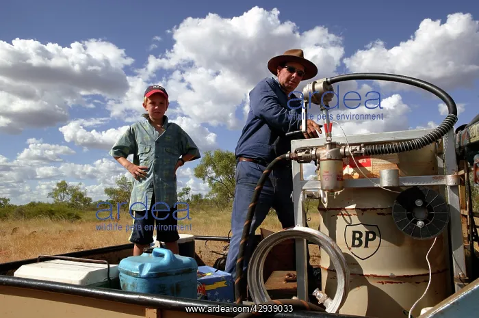 : Petrol pump in outback Australia.Pilot refuelling : Petrol pump in outback Australia.Pilot refuelling