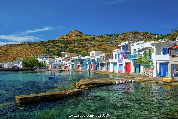 : Picturesque Greek fishing village with white houses : Picturesque Greek fishing village with white houses