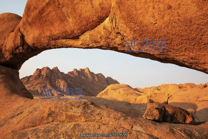 : The Pondok mountains seen through 'The Bridge' belong to the Spitzkoppe mountain compound : The Pondok mountains seen through 'The Bridge' belong to the Spitzkoppe mountain compound