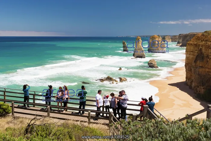 : Port Campbell, Australia, JAN 27: Tourists enjoy t : Port Campbell, Australia, JAN 27: Tourists enjoy t