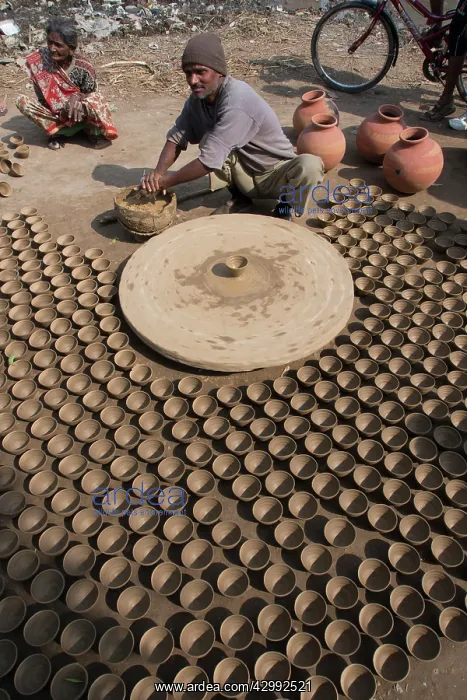 : Potter working at roadside : Potter working at roadside