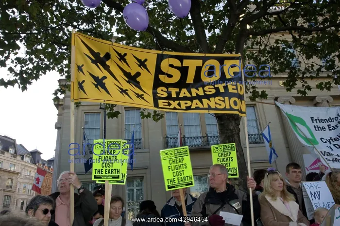 : Protesters carrying with Cheap Flights Cost the : Protesters carrying with Cheap Flights Cost the