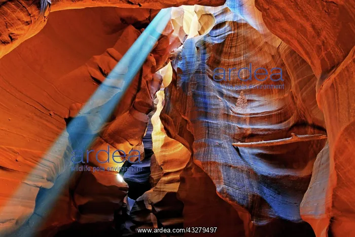 : Rays of light falling on yellow-red sandstone formations : Rays of light falling on yellow-red sandstone formations