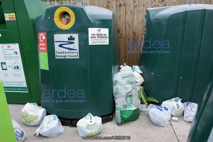 : Recycling - overflowing plastic recycling bins : Recycling - overflowing plastic recycling bins