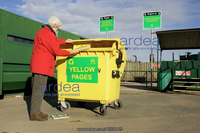 : Recycling - Woman recycling Yellow Page directory : Recycling - Woman recycling Yellow Page directory