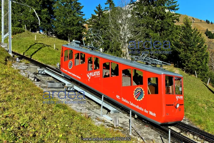 : Red car of the Pilatusbahn on the ascent to Mount : Red car of the Pilatusbahn on the ascent to Mount