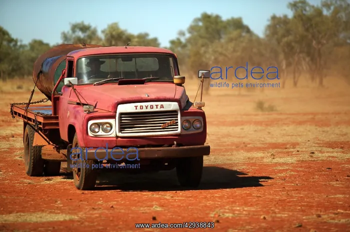  : Red truck.Water truck used to transport water to
