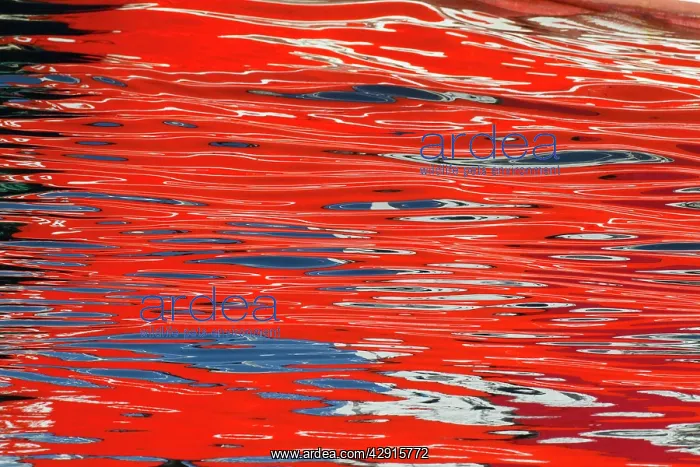 : Reflections - of fishing vessels colours in habour water : Reflections - of fishing vessels colours in habour water