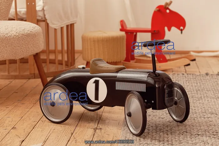 : Retro vintage racing black children's car in sty : Retro vintage racing black children's car in sty