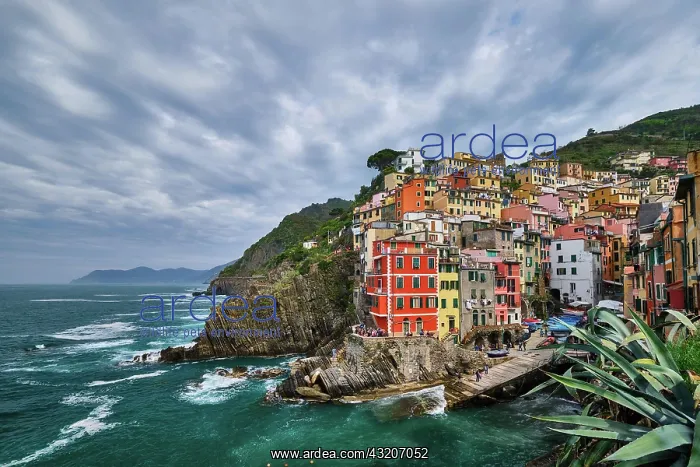 : Riomaggiore village popular tourist destination : Riomaggiore village popular tourist destination