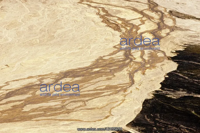 : River delta between mountains in vulcanic landscape : River delta between mountains in vulcanic landscape