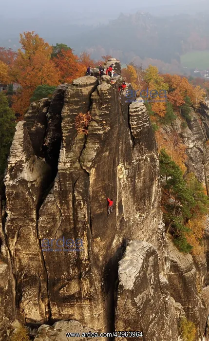 : Rock Climbers - Elbe Sandstone Mountains bastion - Autumn : Rock Climbers - Elbe Sandstone Mountains bastion - Autumn