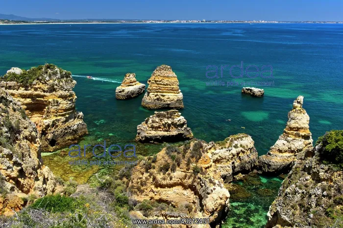 : Rock formations at Camilo beach, Praia do Camilo : Rock formations at Camilo beach, Praia do Camilo