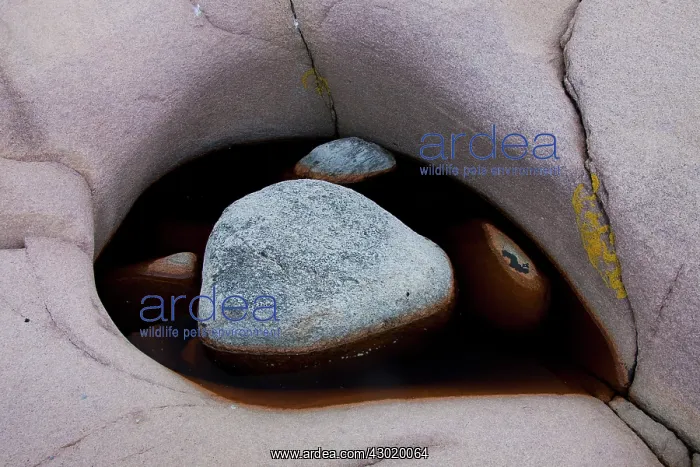 : Rock Formations with reflections in water : Rock Formations with reflections in water