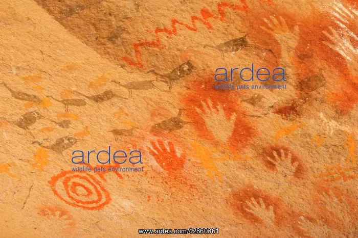 : Rock Paintings - a hunting scene and hands created : Rock Paintings - a hunting scene and hands created