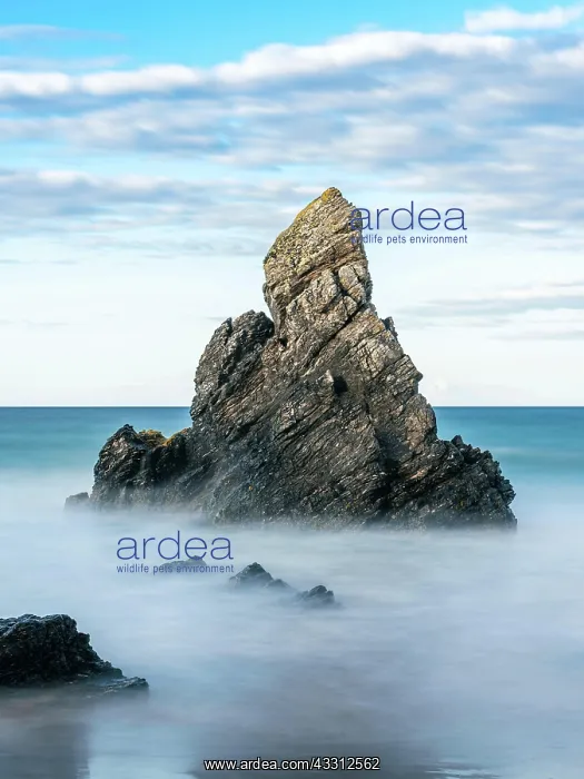 : Rocks on Sango Sands Beach Bay Durness in long exposure : Rocks on Sango Sands Beach Bay Durness in long exposure