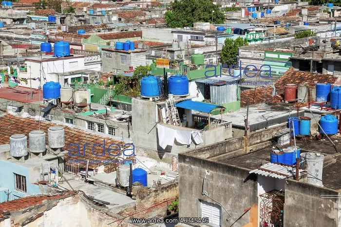 : Rooftop cisterns in a backstreet quarter of Cienfuegos : Rooftop cisterns in a backstreet quarter of Cienfuegos