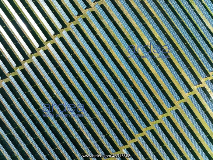 : Rows of solar panels at a photovoltaic plant near : Rows of solar panels at a photovoltaic plant near
