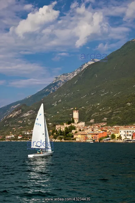 : Sailboat on Lake Garda near the town of : Sailboat on Lake Garda near the town of