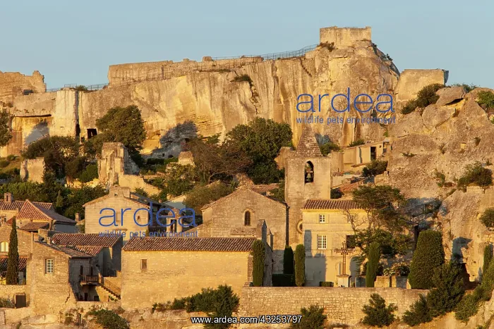 : Setting sun on medieval town of Les Baux : Setting sun on medieval town of Les Baux