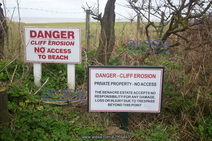 : Signs at Covehithe telling of the danger of cliff erosion : Signs at Covehithe telling of the danger of cliff erosion