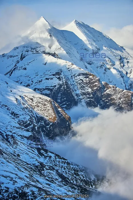 : Snowy Mountains above the clouds at Hochalpenstraie : Snowy Mountains above the clouds at Hochalpenstraie